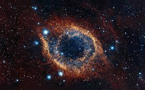 (The "God's Eye" helix nebula - pic taken by by the European Southern Observatory's VISTA telescope http://www.space.com/14282-helix-nebula-eye-amazing-photo.html )